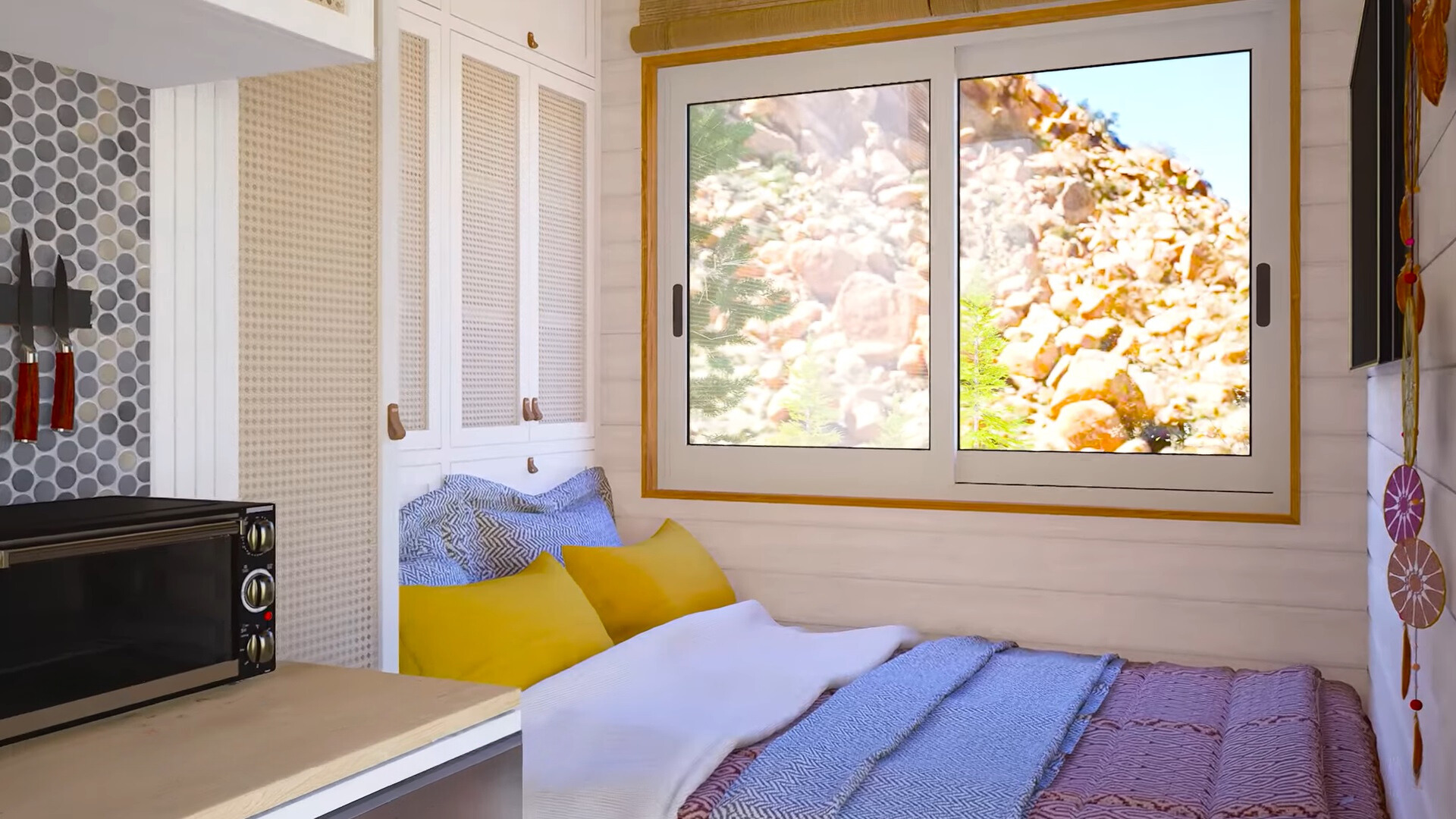 bedroom with a bed, a window next to it, a flat screen tv opposite the bed and a white closet above the bed