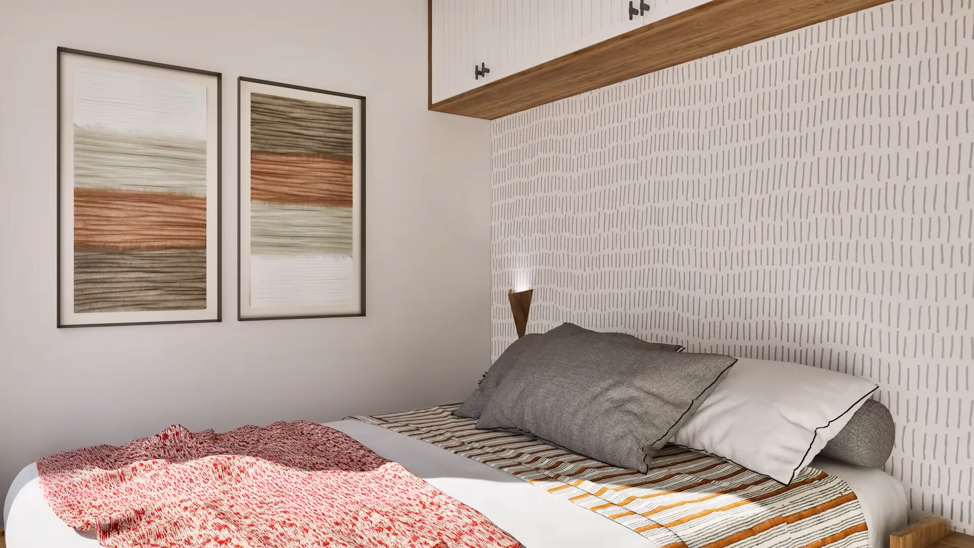 bedroom with a big bed, patterned wall behind the bed, two art pieces next to the bed