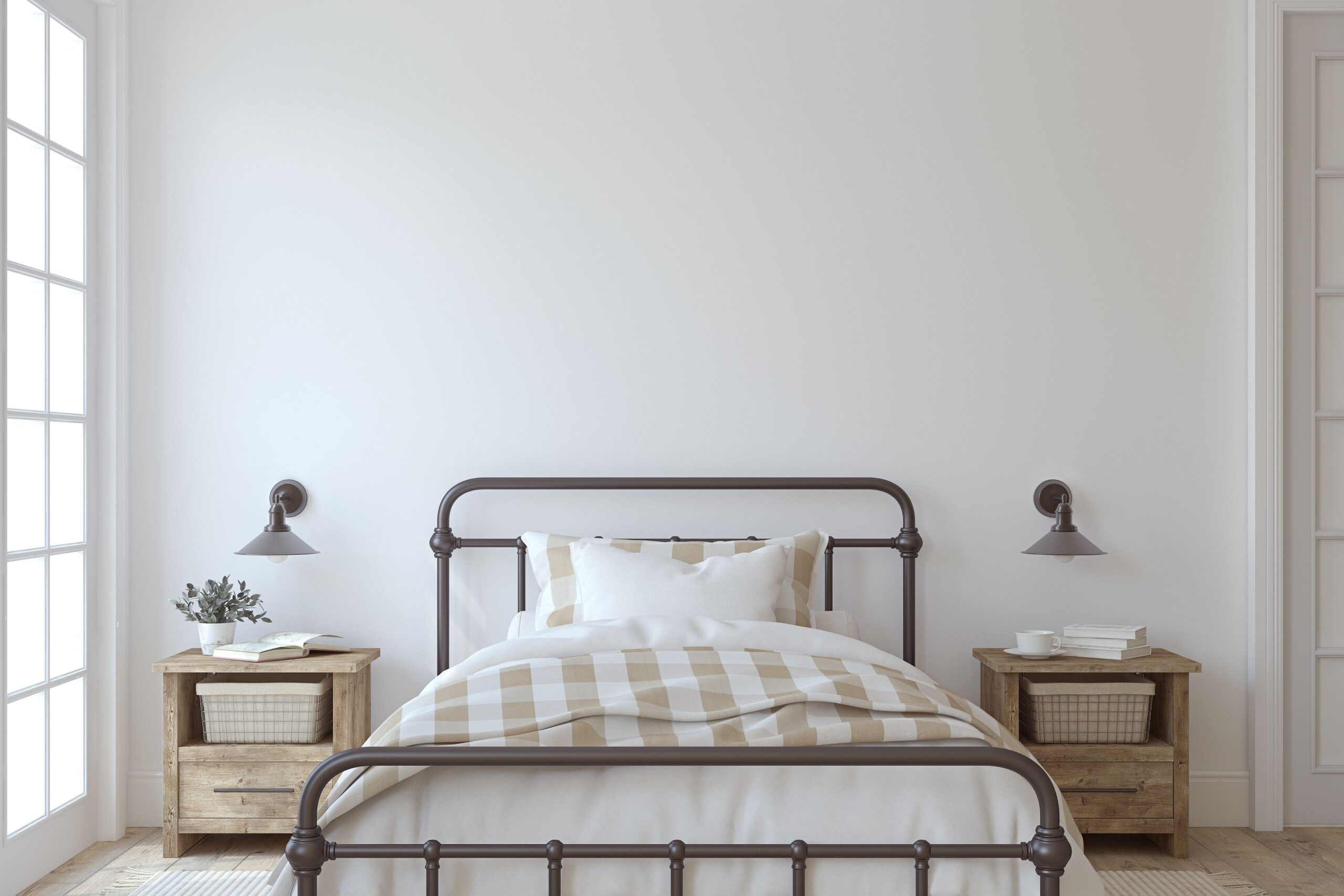 minimalist bedroom with a white wall, two light beige bedside tables