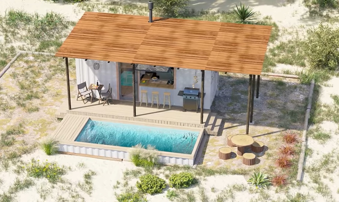 exterior of a container house with a pool in front and a wooden table with wood logs as stools around it