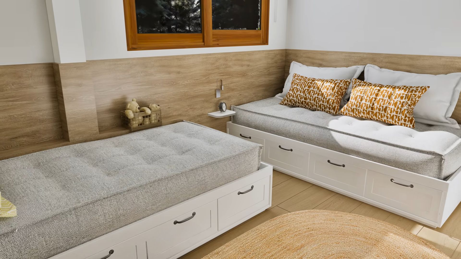 kids bedroom with two beds, lots of throw pillows, and drawers under them, a wooden wall siding oing halfway up the wall and around the room