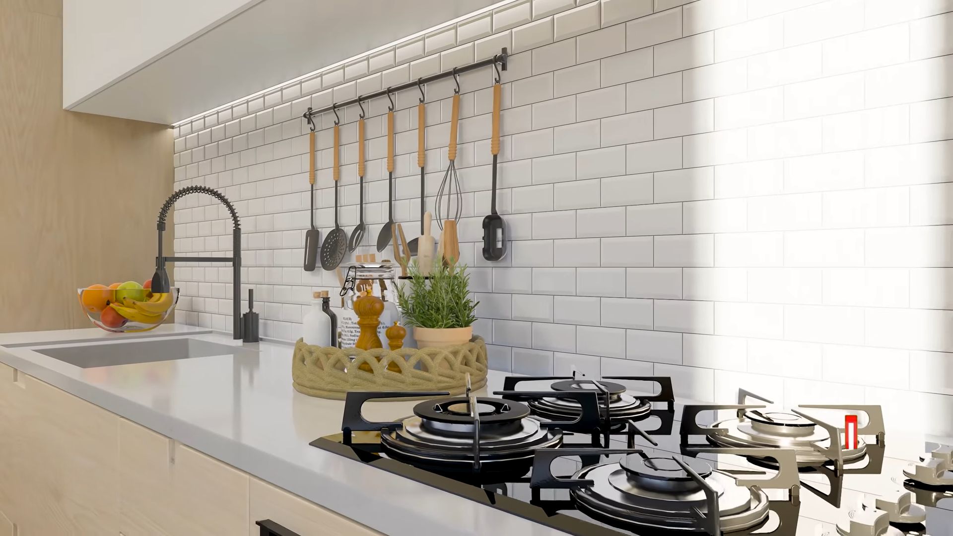 Kitchen with cooktop and hanging utensils