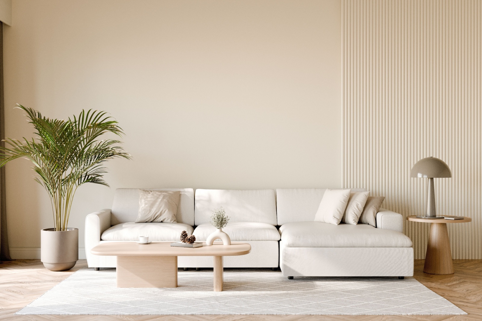 living room with a beige wall, beige couch, beige wooden table, gray carpet, light brown wooden small table next to the couch, palm tree plant next to the couch