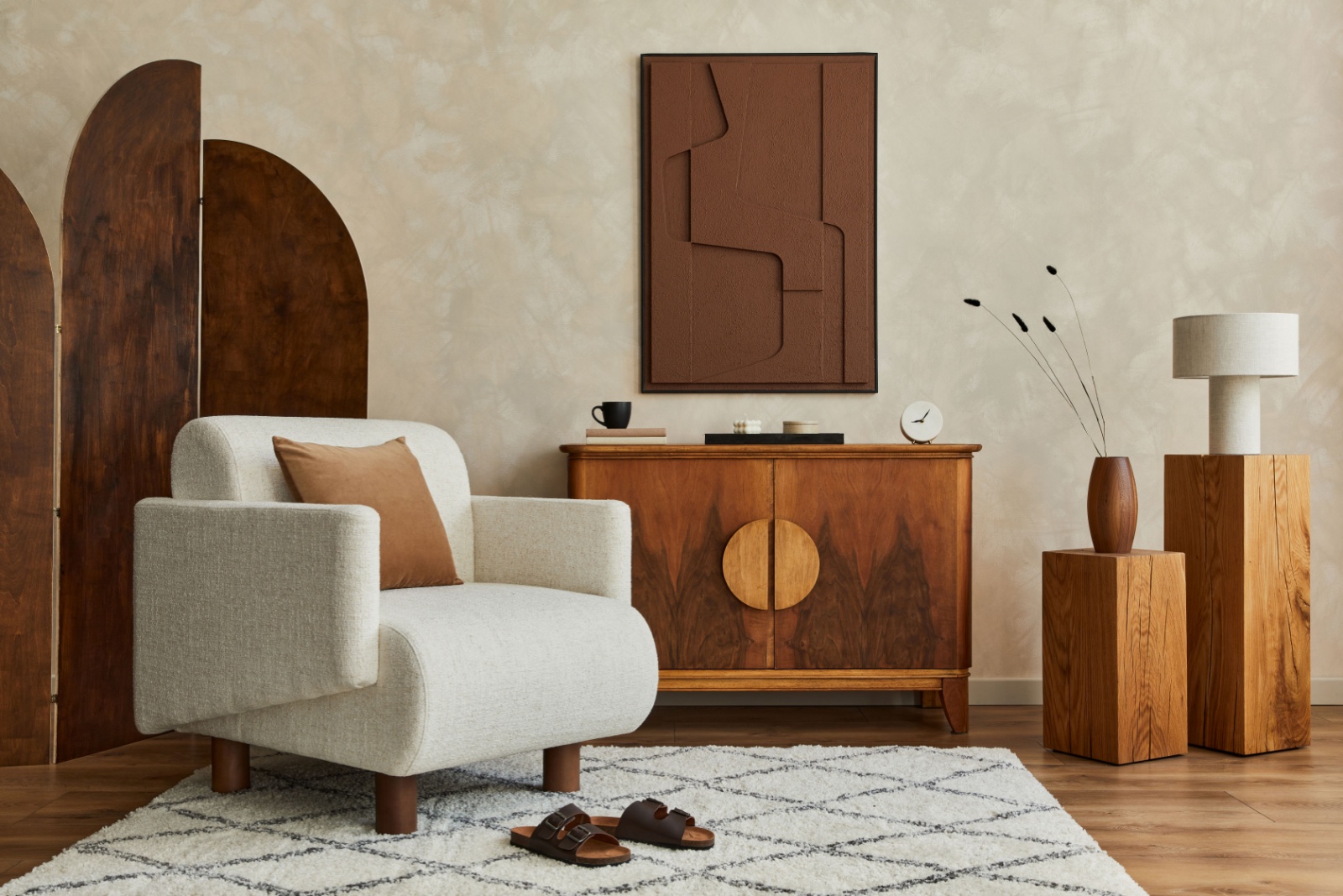 living room with a white chair, wooden decor