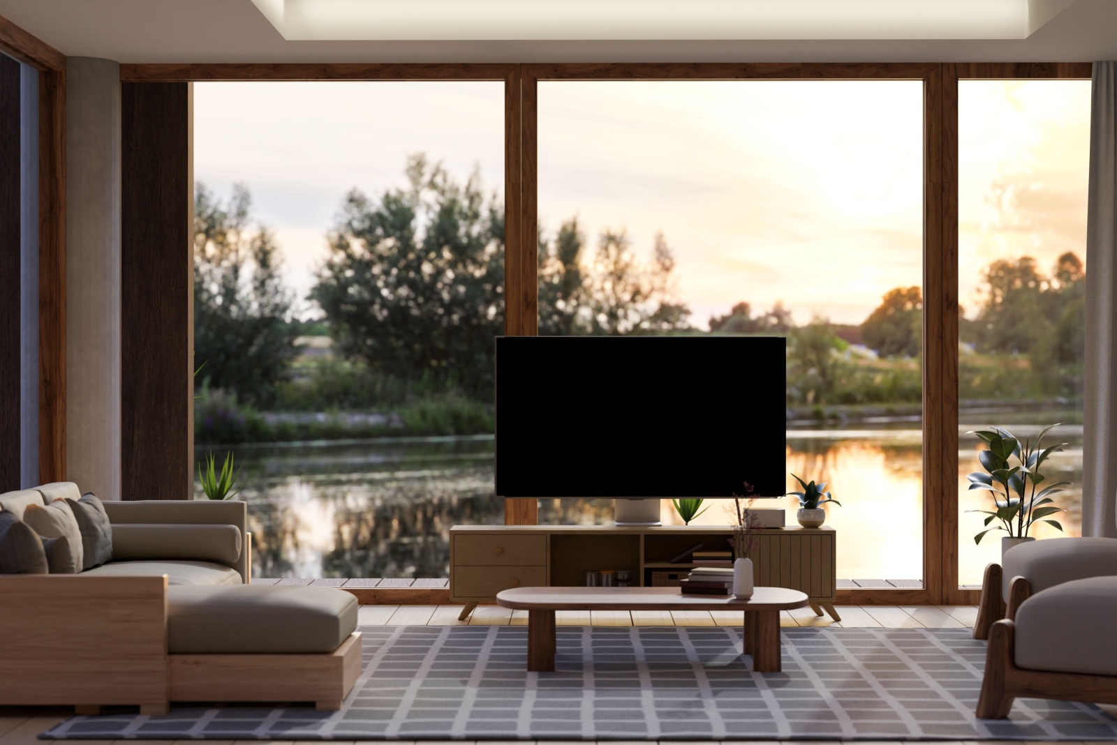 minimalist living room with a floor to ceiling window with a lake view, flat screen tv, round table and comfortable furniture