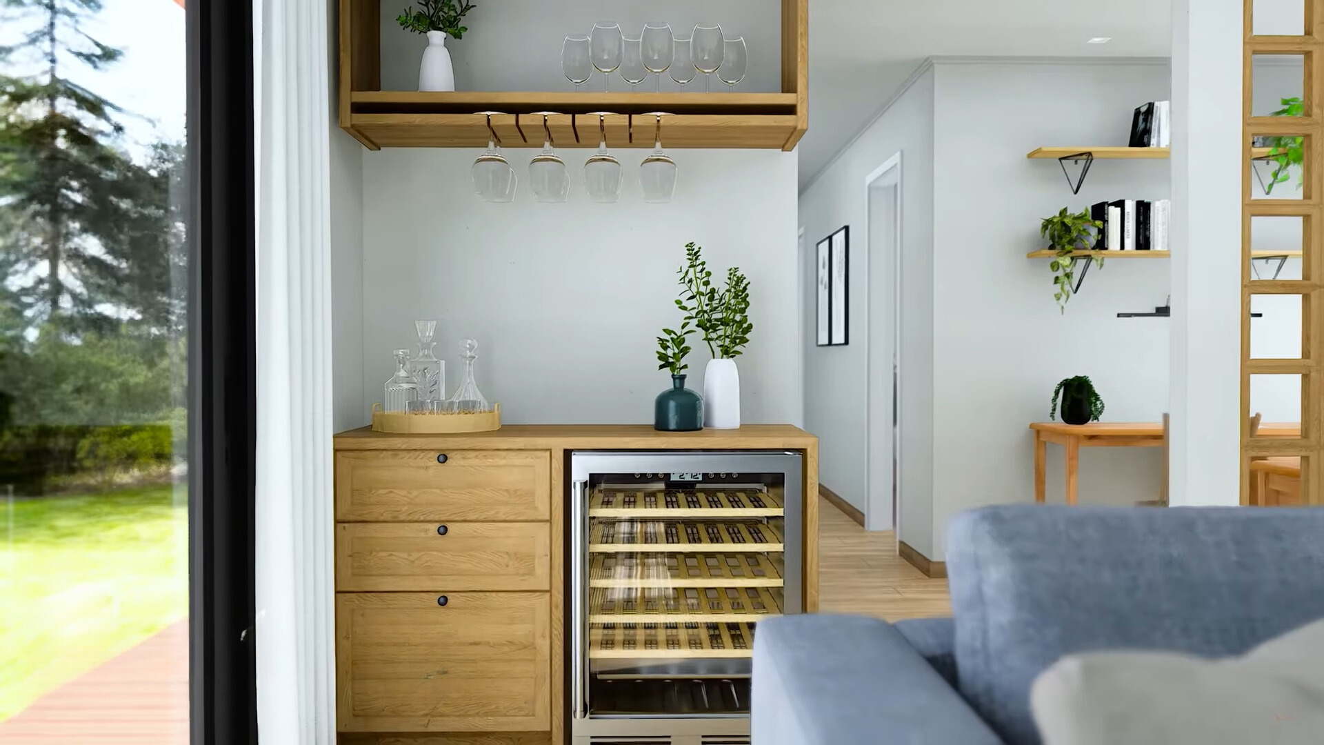 mini bar in the corner of the living room with a wooden cabinet and a wooden shelf above with glasses displayed