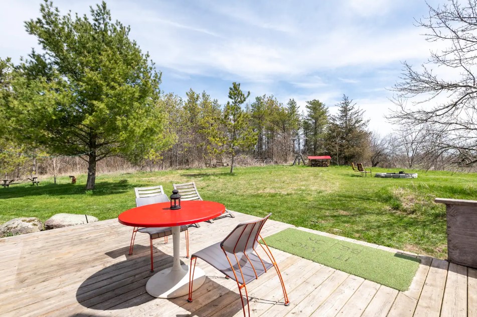 red table and chairs outside