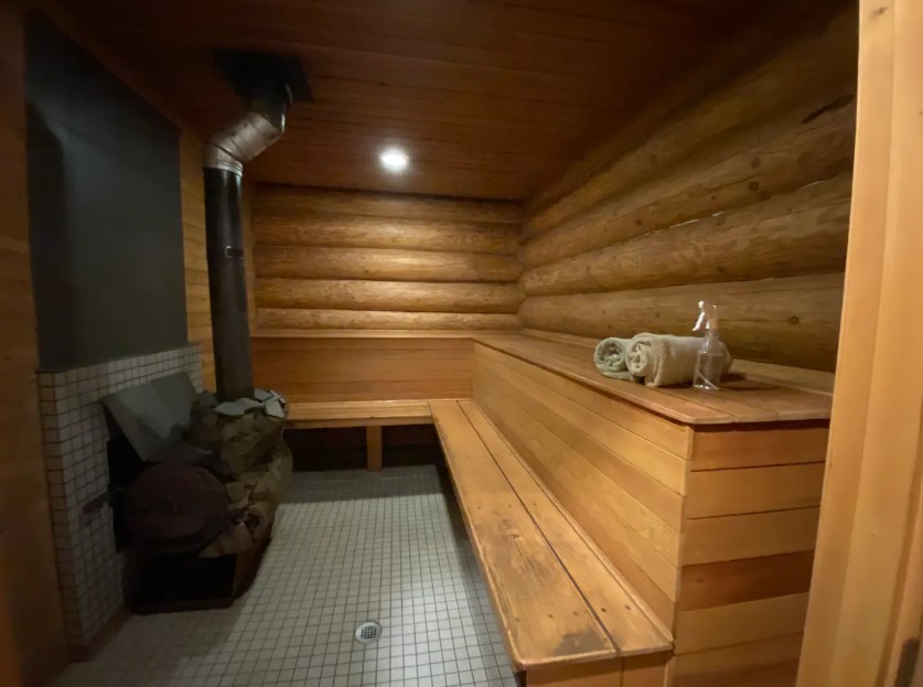 private sauna inside of a log cabin