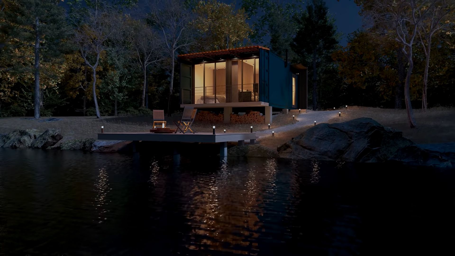 Tiny container home on lake by night