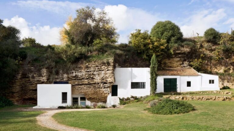 cave house with white exterior