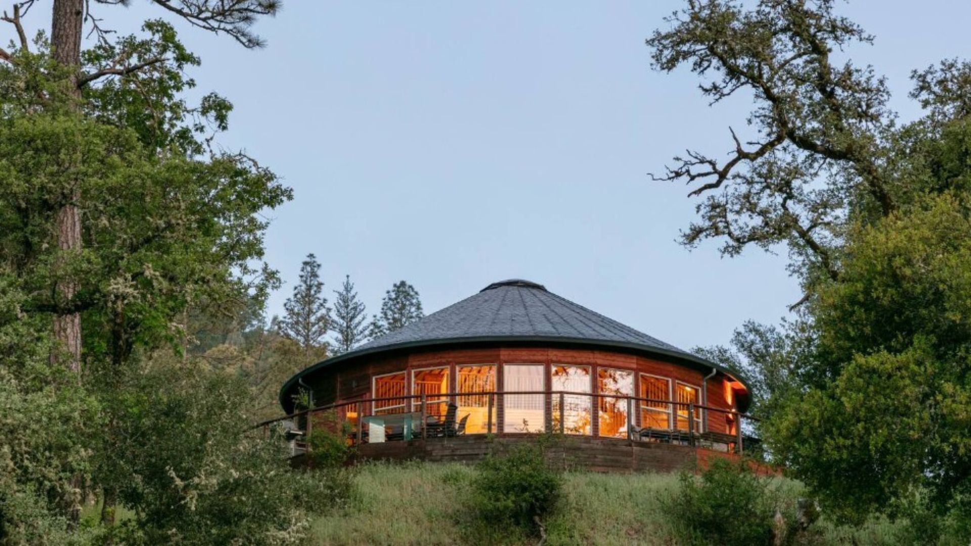 exterior of a round home in nature