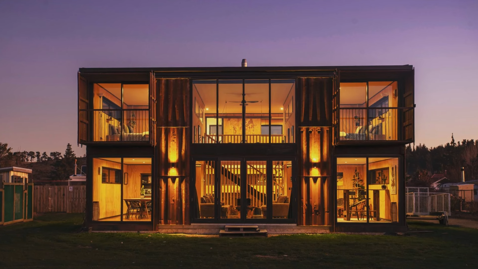 exterior of a container mansion at night