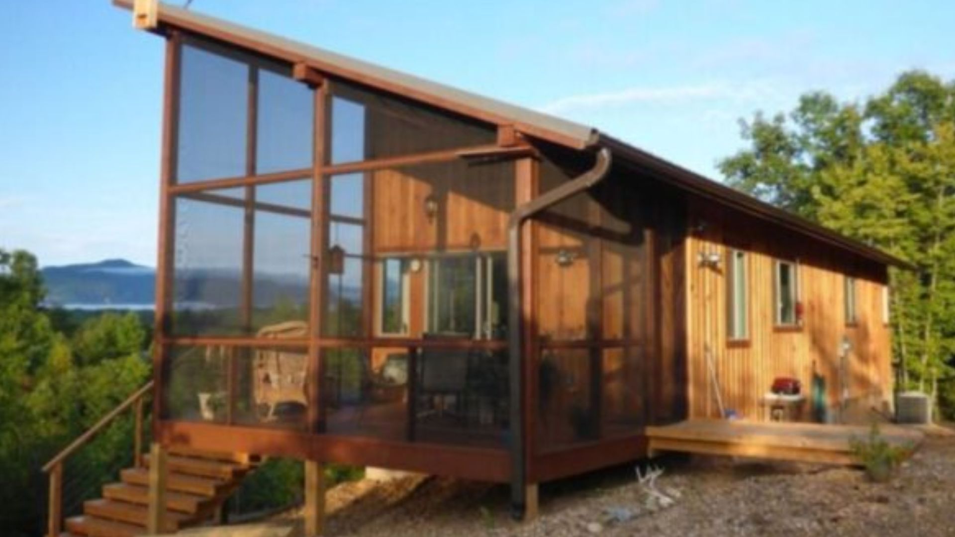 704ft log cabin made by a couple who followed their dreams, made of wood with a large porch