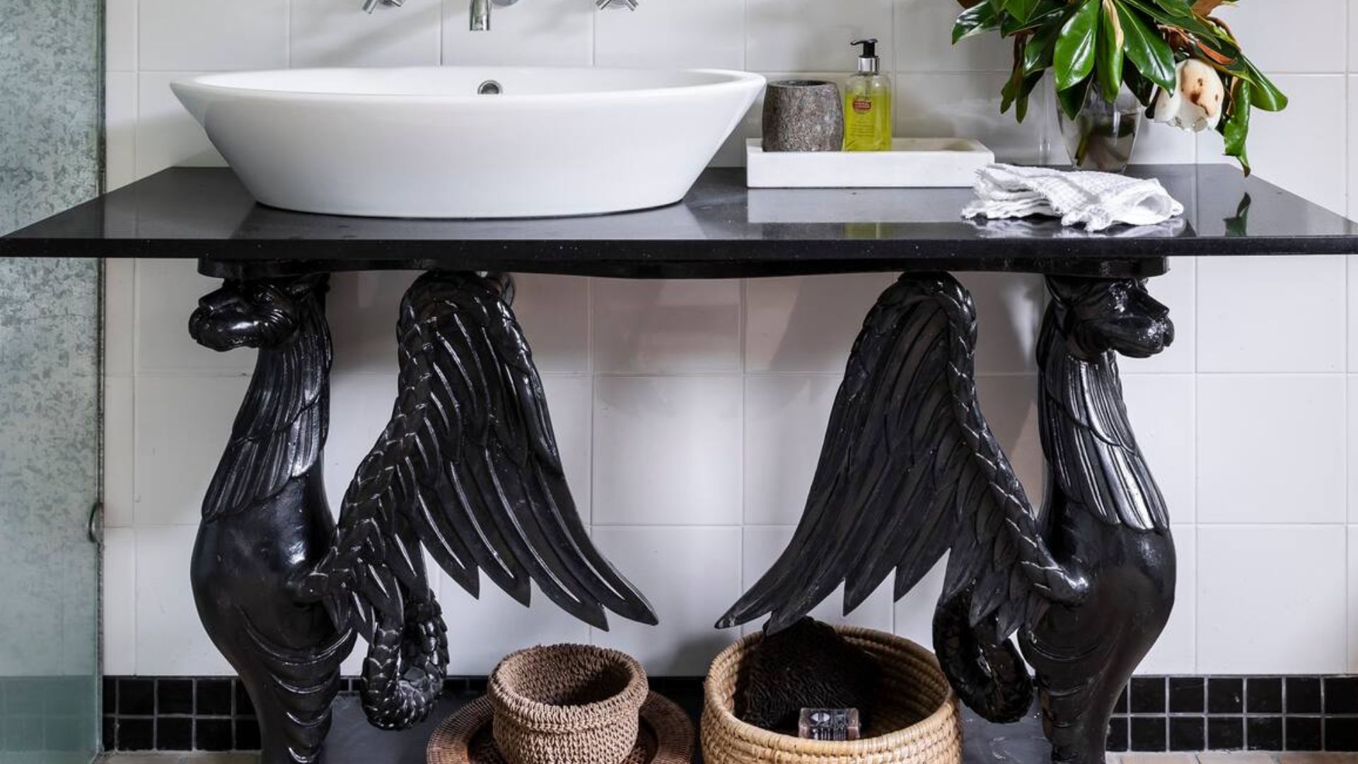 goreous sink and vanity with sculptures