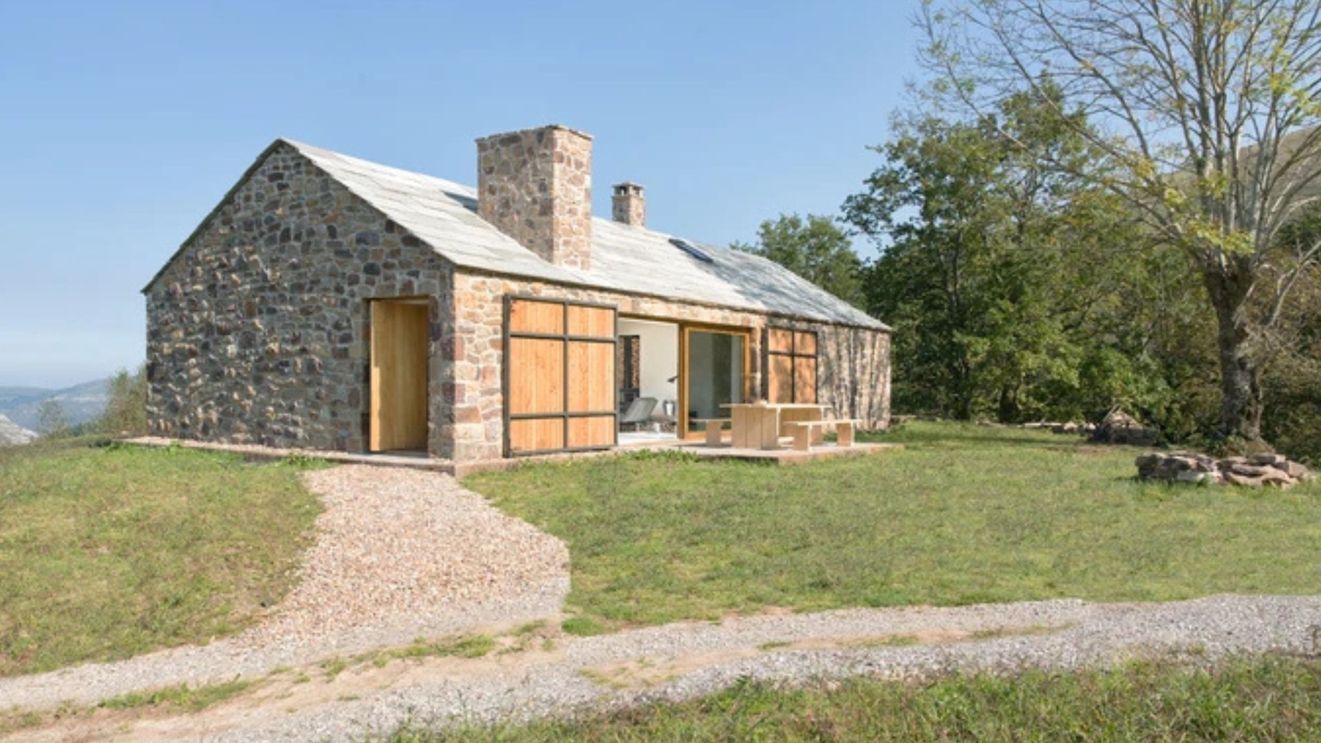 exterior of a restored tiny home that was once a house barn