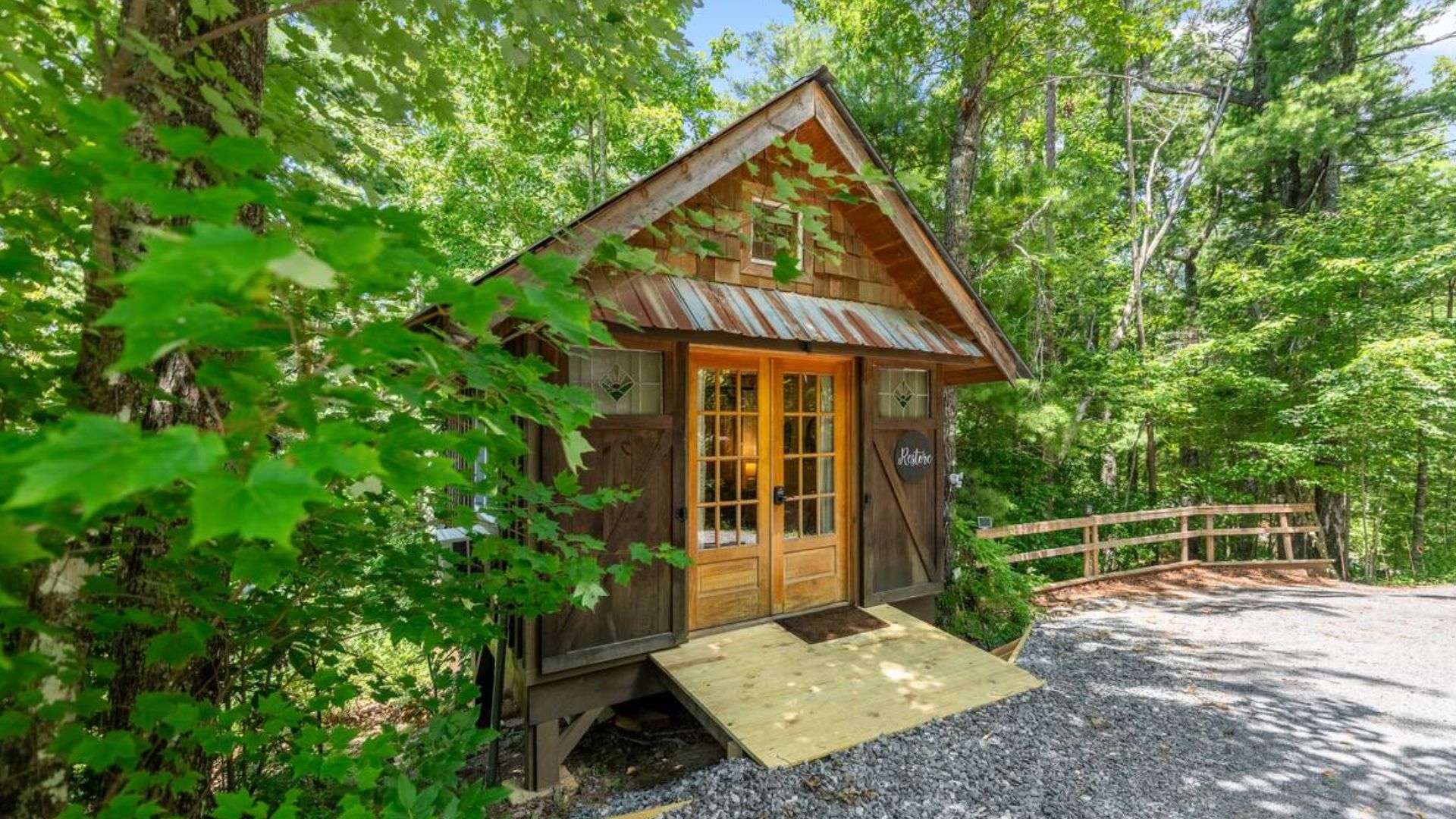 exterior of a cozy cabin in the woods