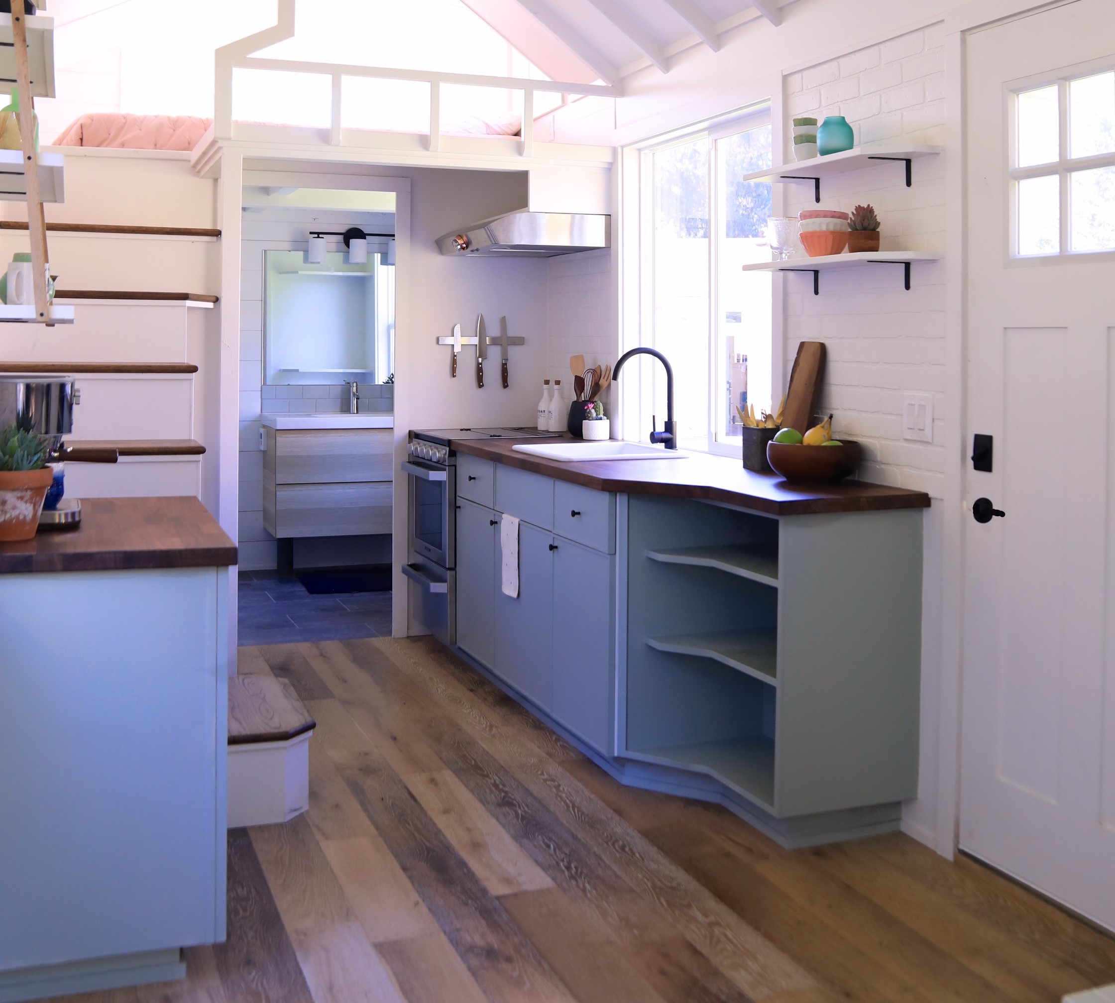 Blue tiny kitchen with tons of storage