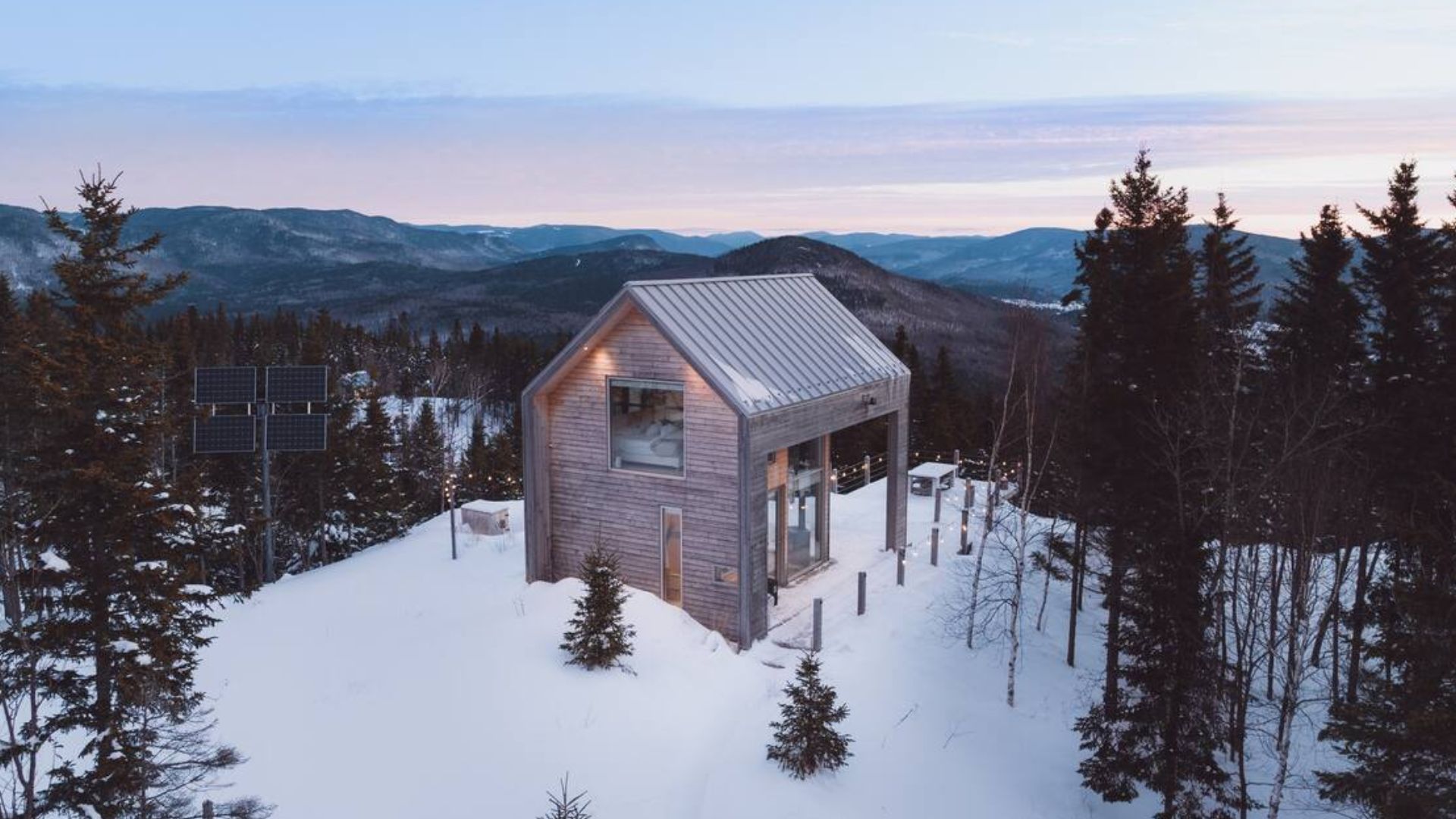 exterior of a cabin in snow time