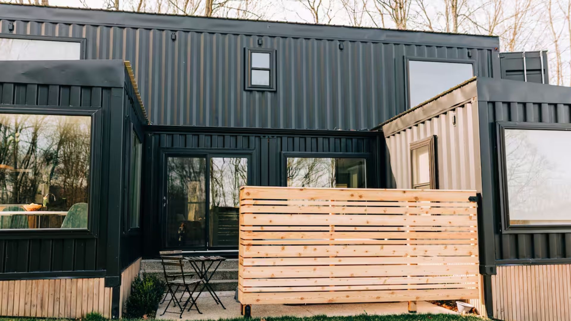 exterior of a container house with black walls