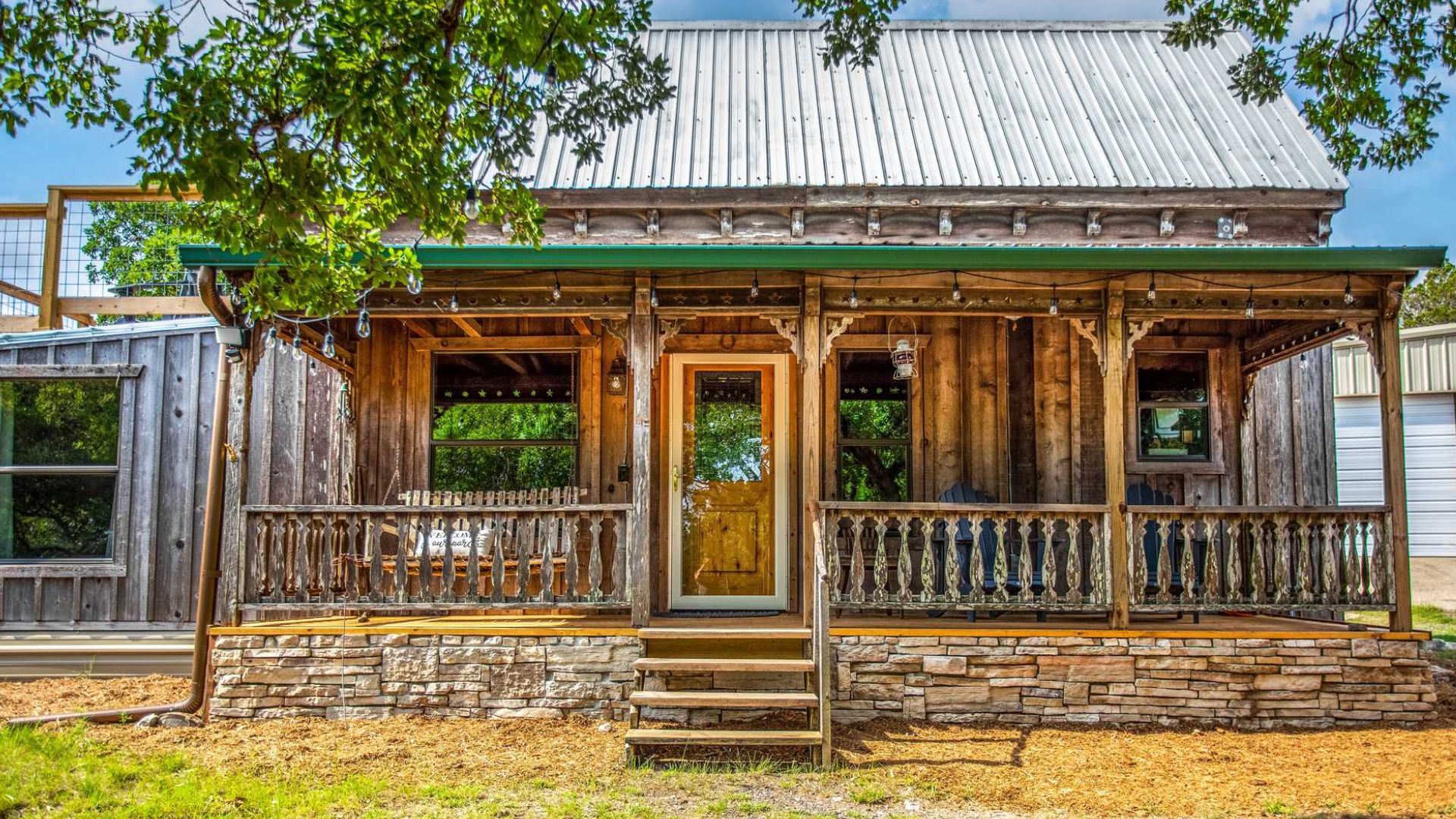 Rustic farmhouse cabin with large windows