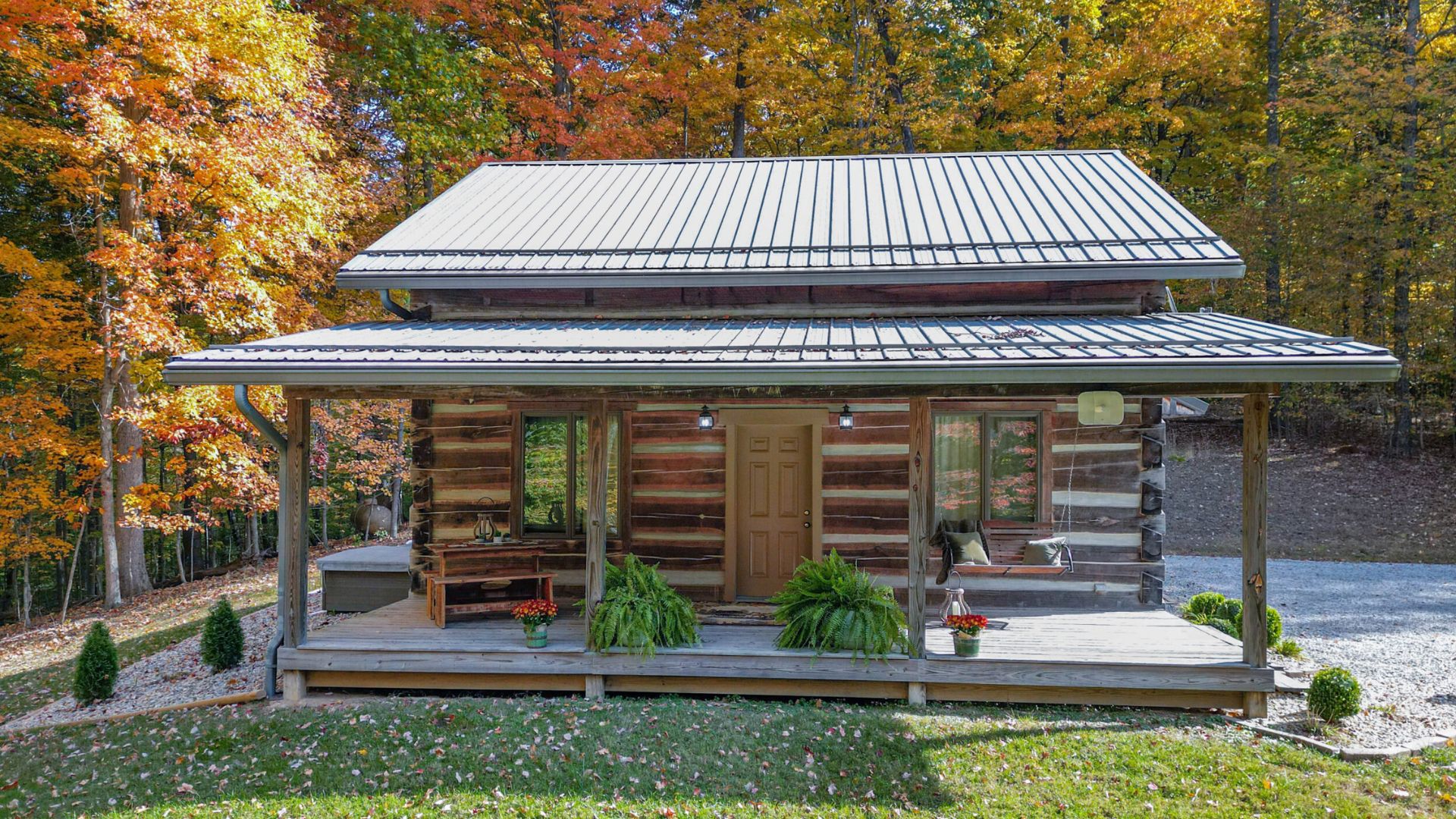 exterior of a cabin surrounded by nature