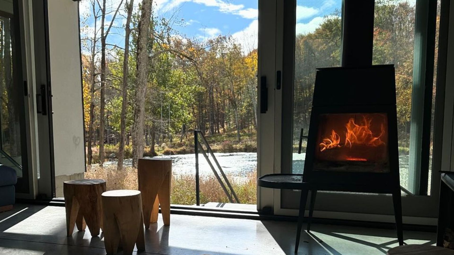 cool fireplace and unique chairs next to it