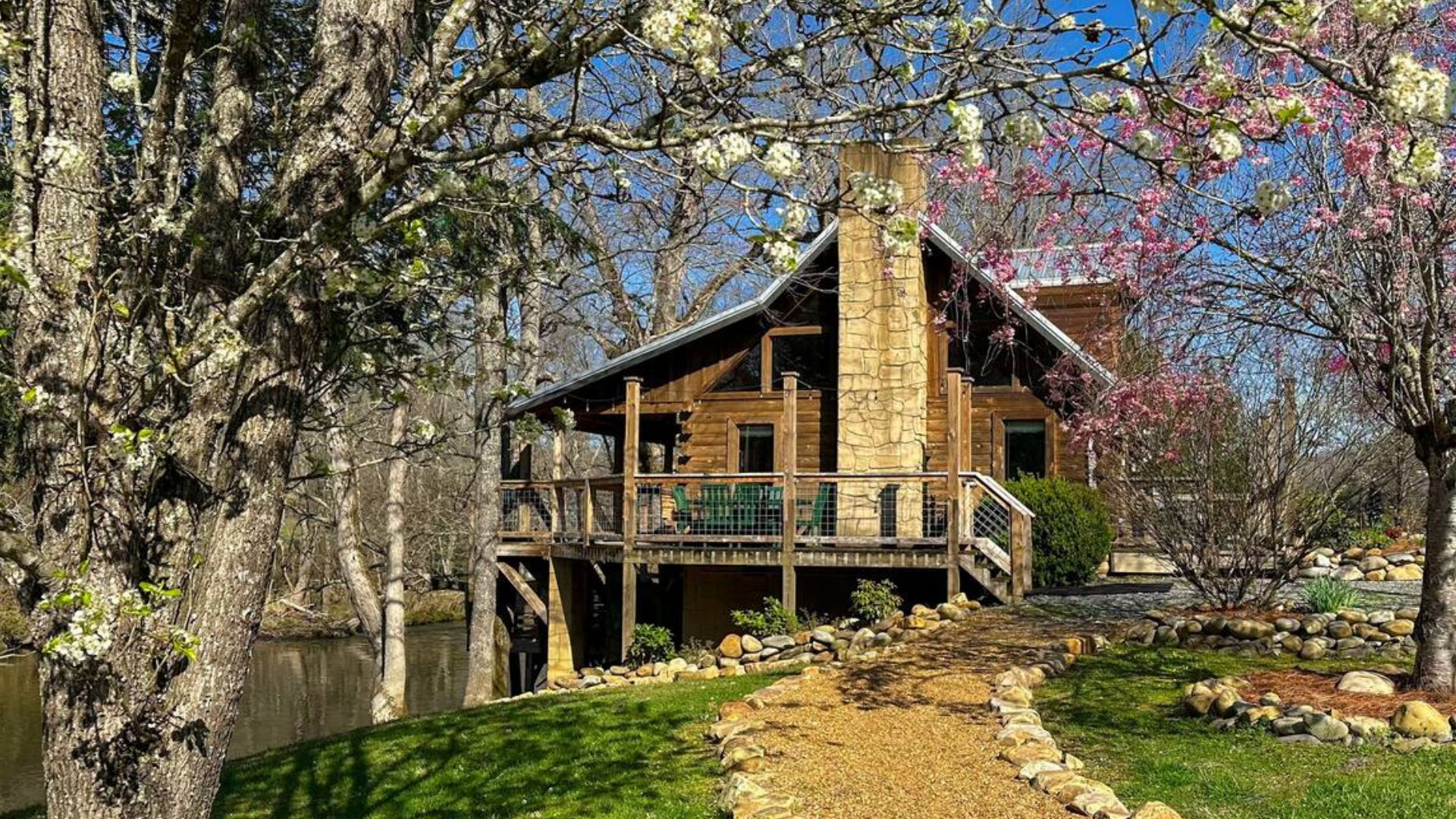 exterior of a cabin with flowers and plants outside