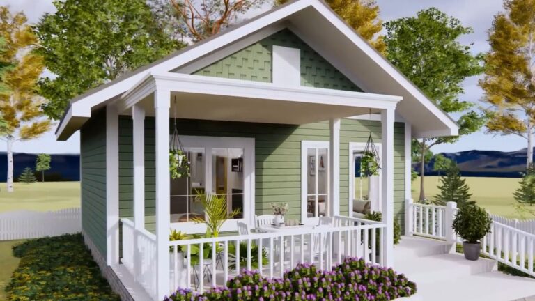 exterior of a lovely tiny green home with a porch