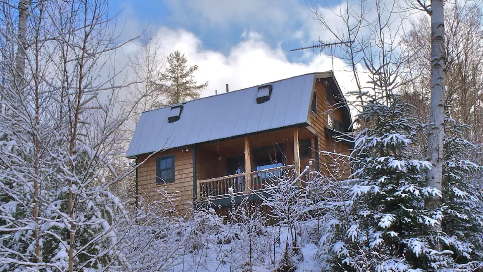 exterior of a log cabin in winter