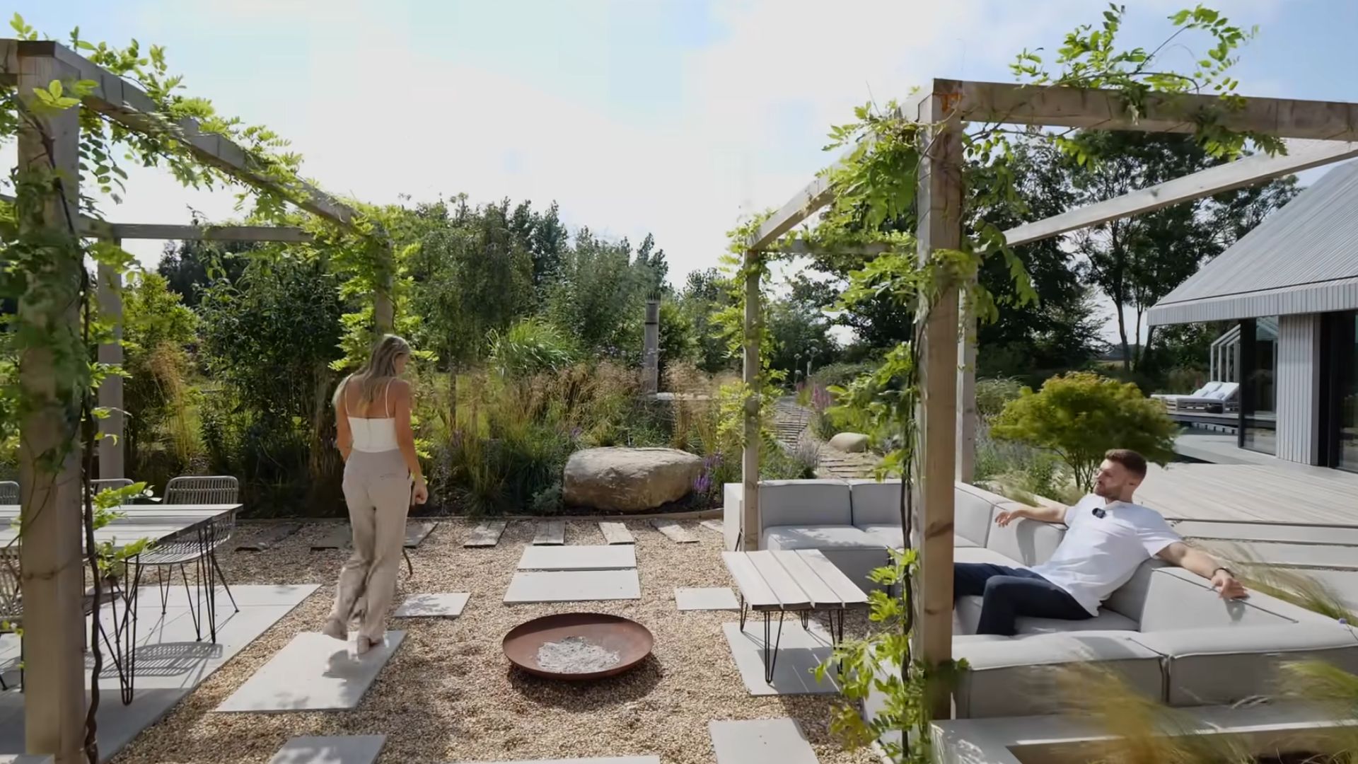 garden with a fire pit area and lots of seating spots