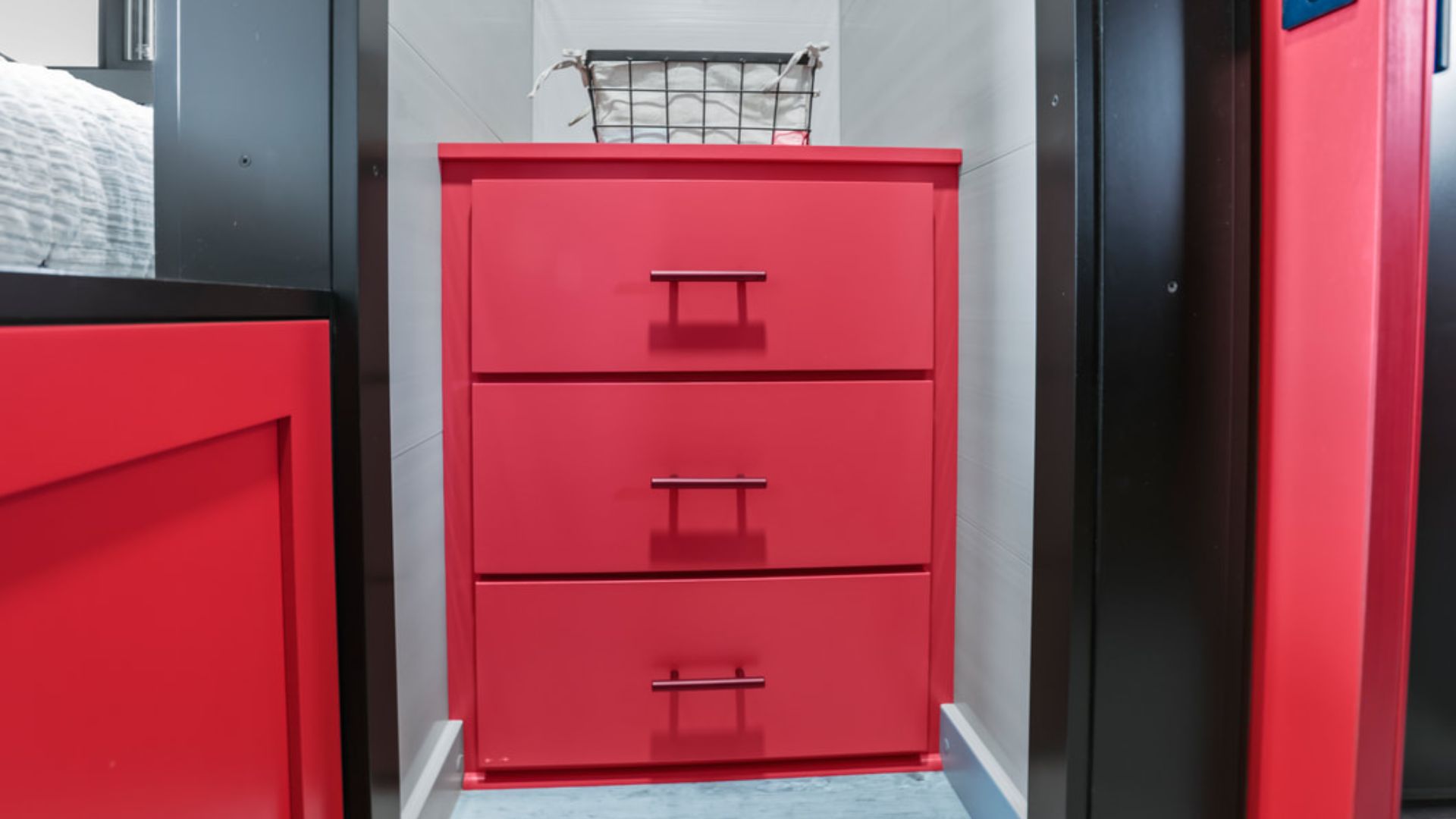 bright red cabinet with drawers