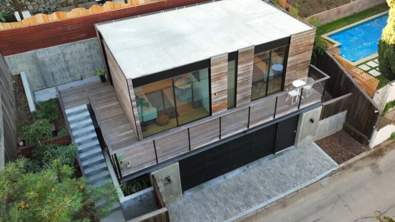 A tiny house with glass panels