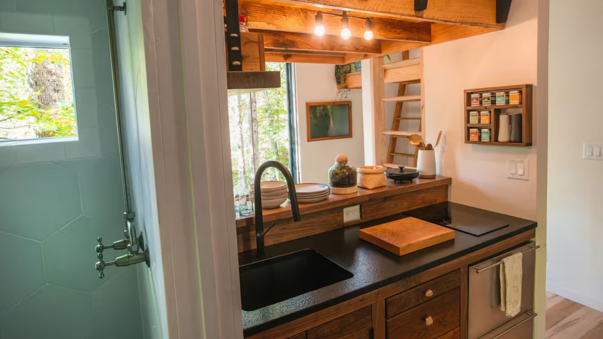 cool wooden kitchen under the loft