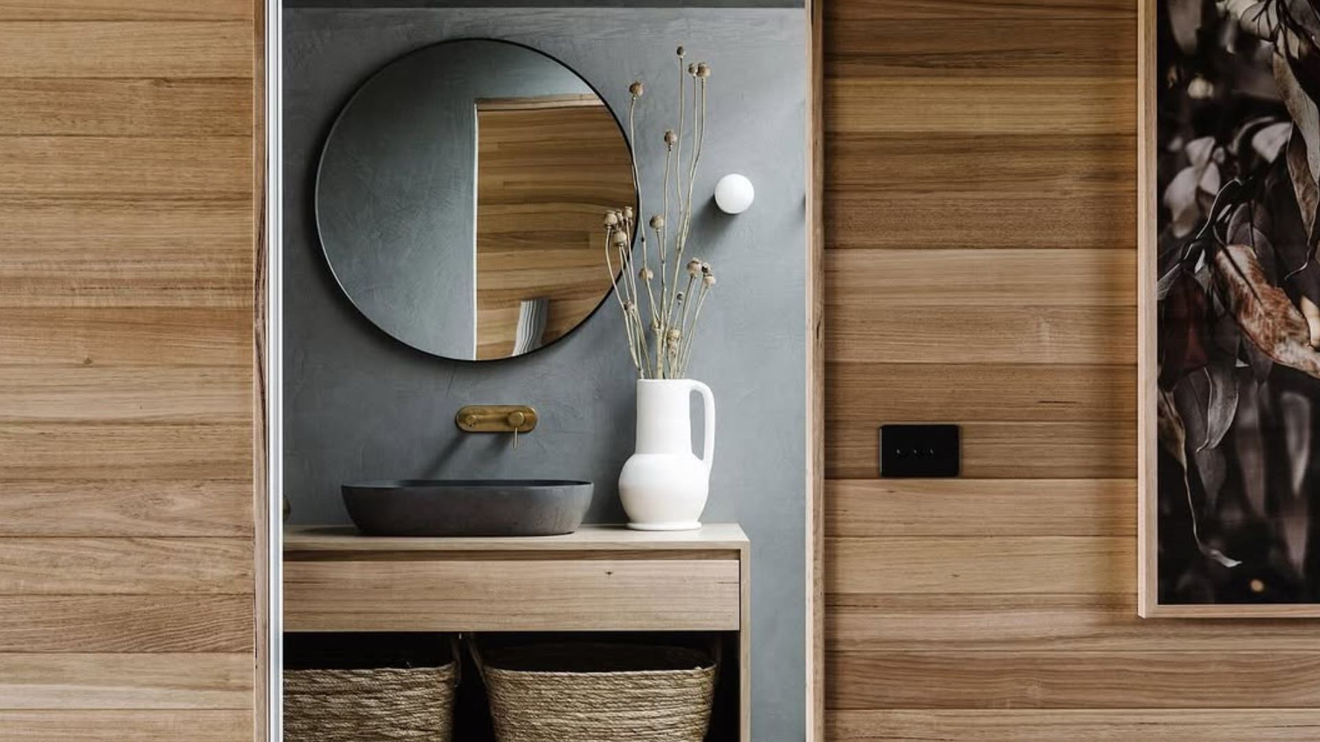 beautiful bathrooom visible through the door