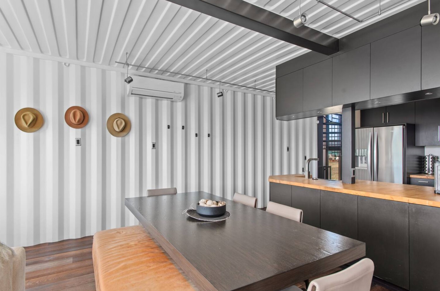 Rustic dining area with a hat wall