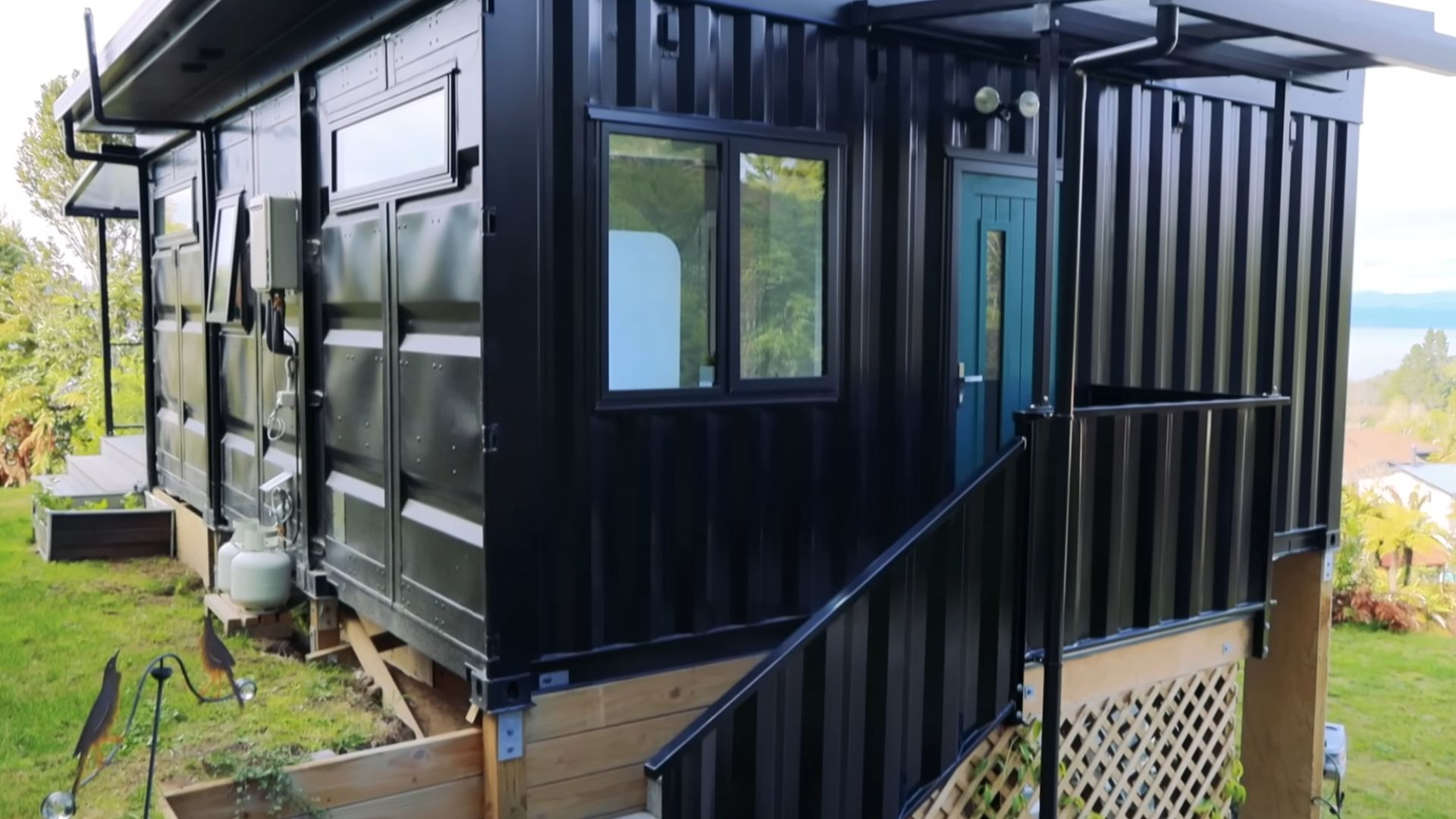 exterior of a black container house