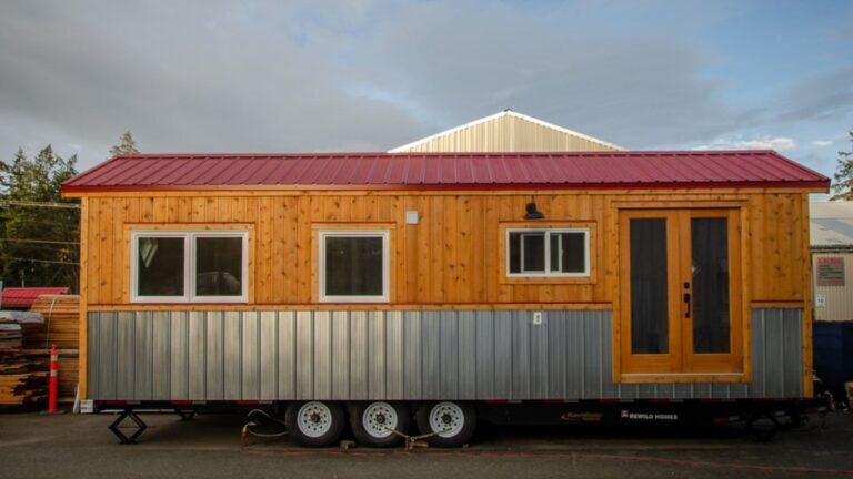 orange wod exterior of a thow with a red roof
