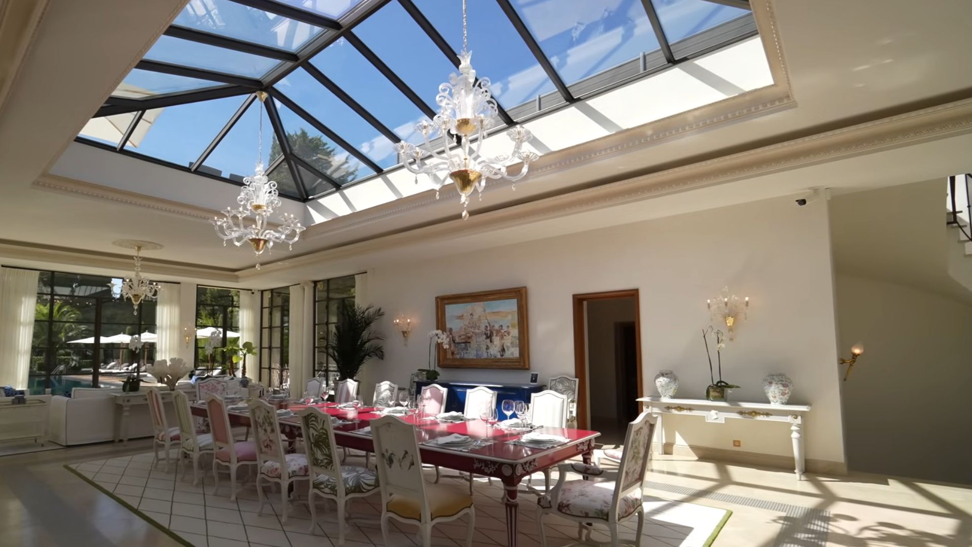 stunning dining room with a beautiful skylight above i