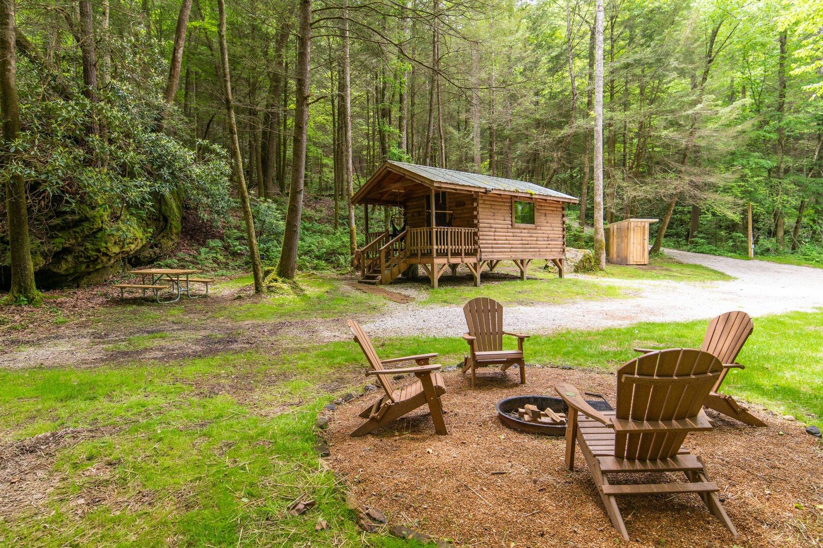 Tiny wooden cabin by the creek with a stunning backyard