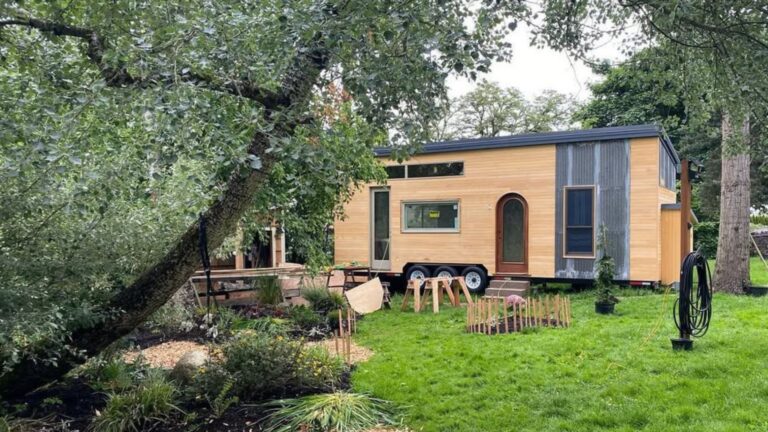 Tiny home with arched front door