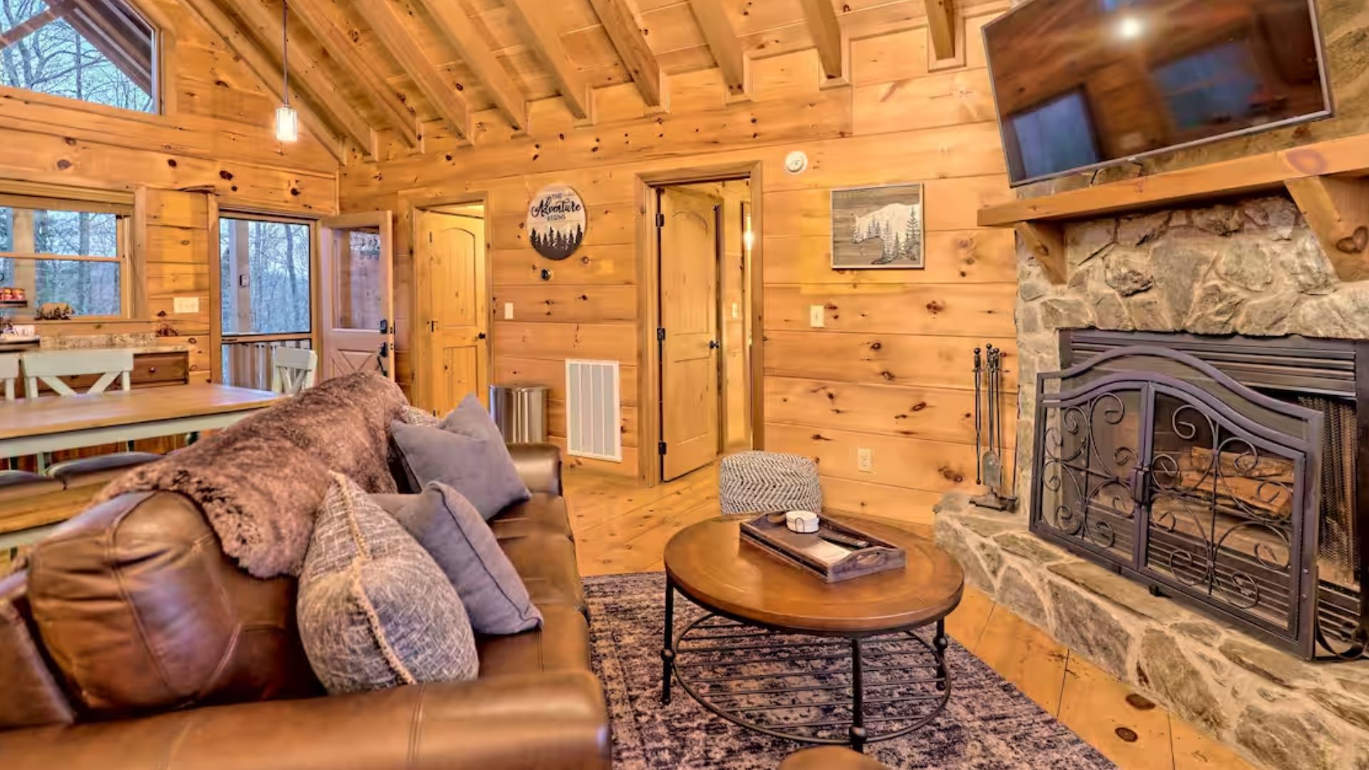 pretty stone fireplace in the living room