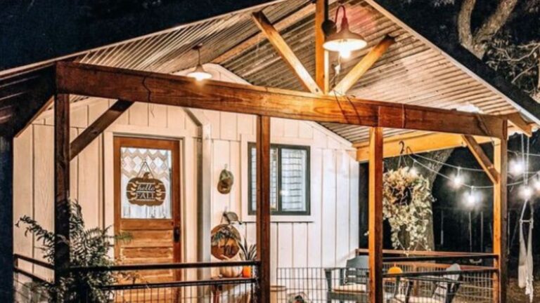 exterior of a tiny home with string lights