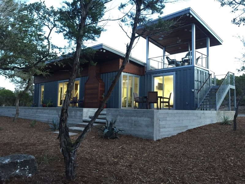 Whiskey bend ranch container home with an elevated deck