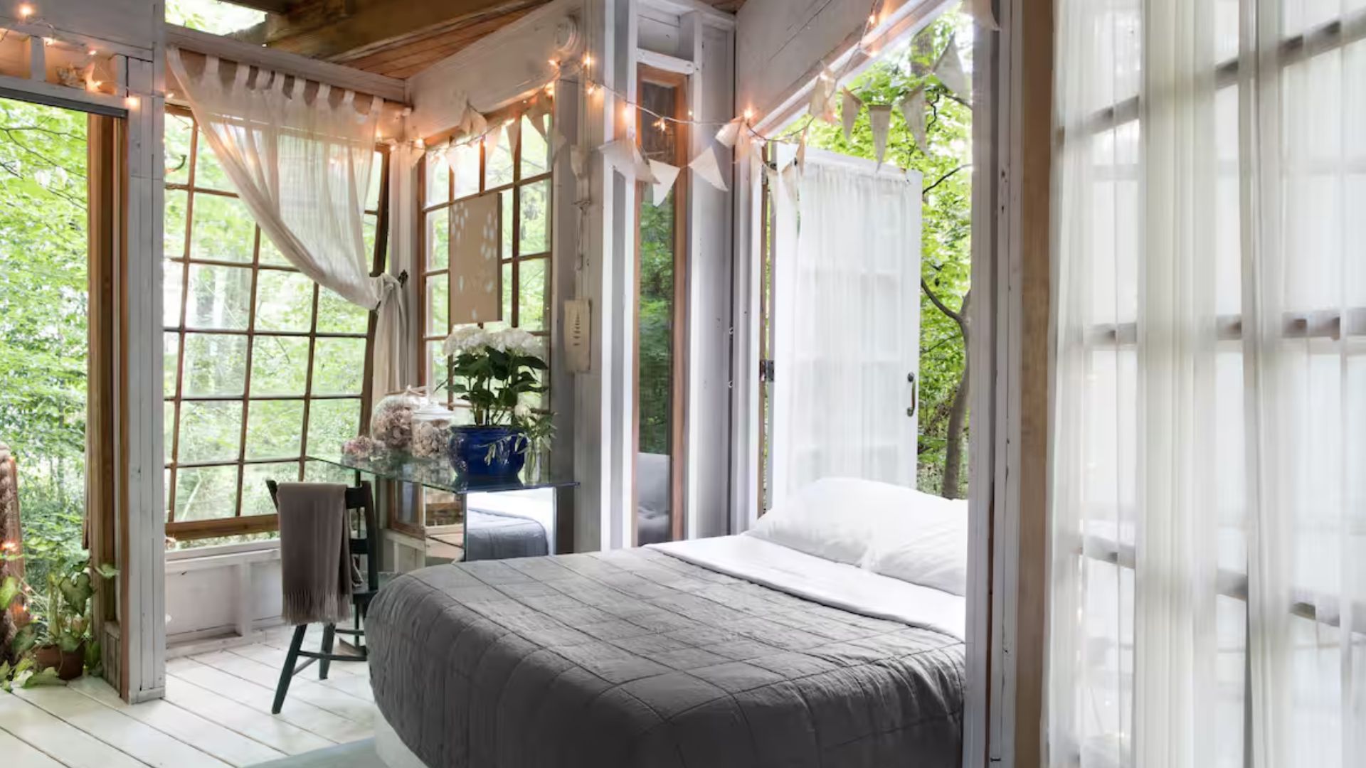 pretty bedroom with open windows