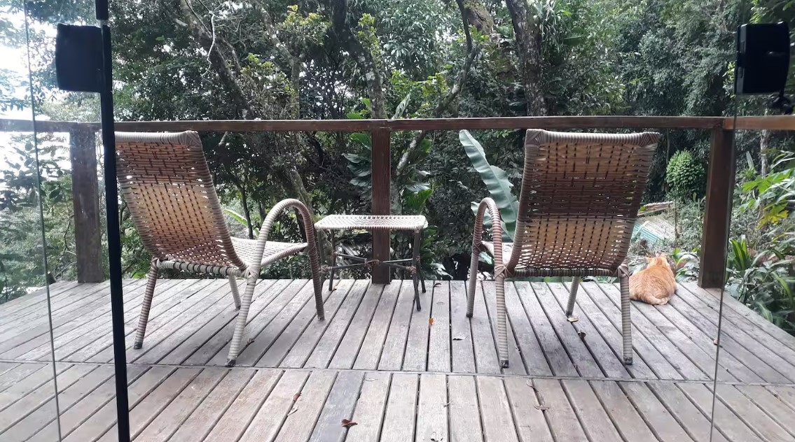 balcony with two chairs and a mini table