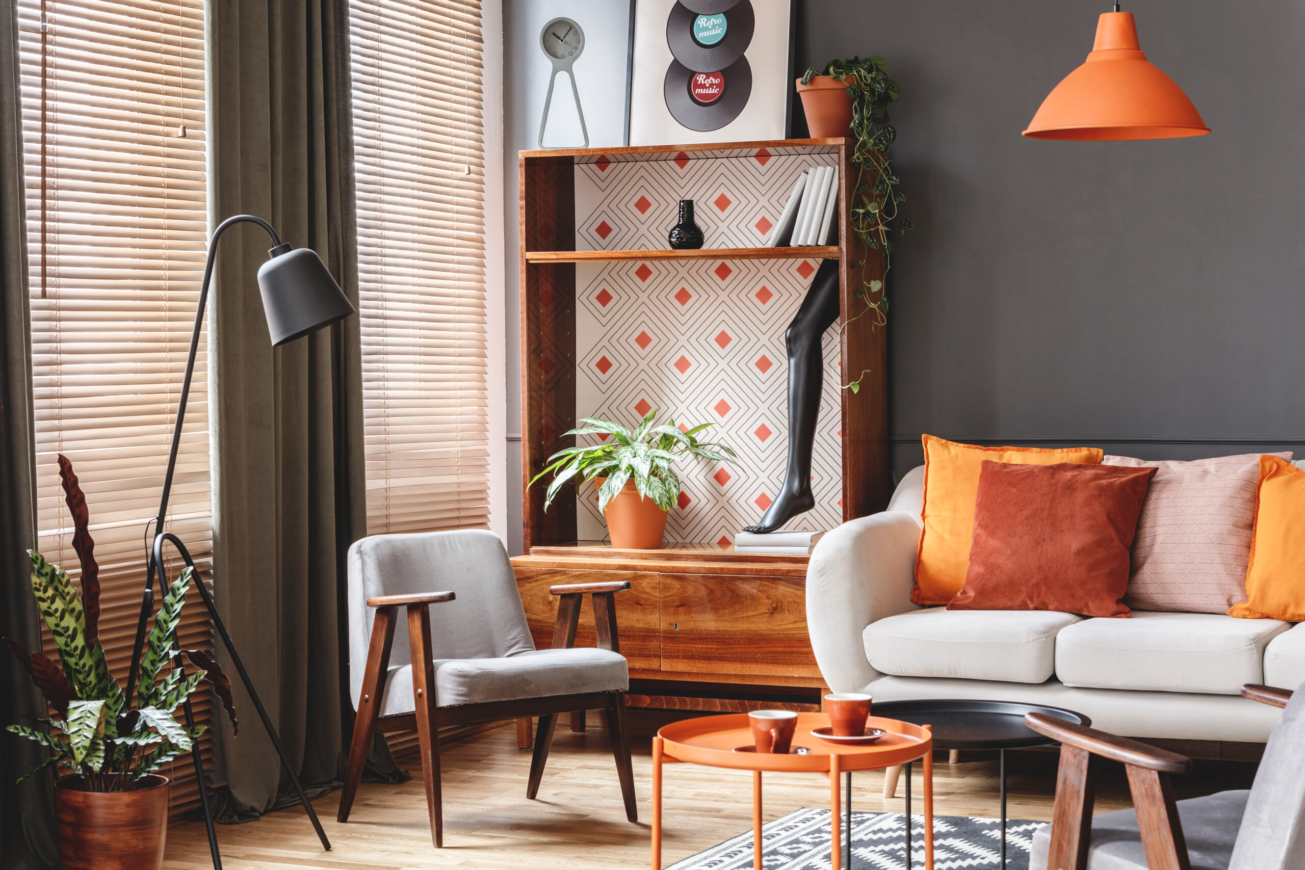 Colorful retro orange living room with decorations