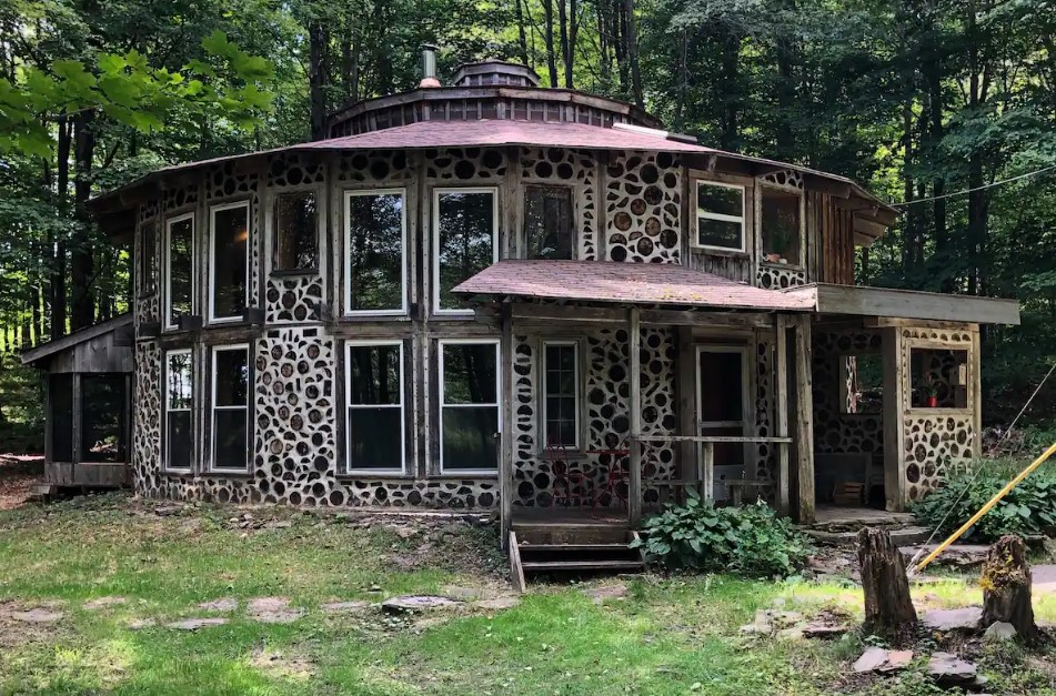 round home with stones in the woods