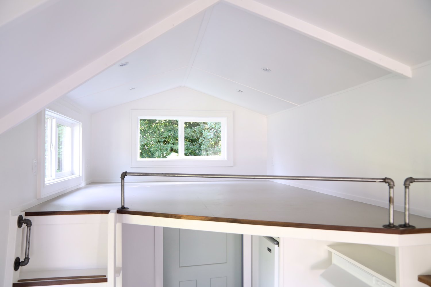 empty loft area with white walls