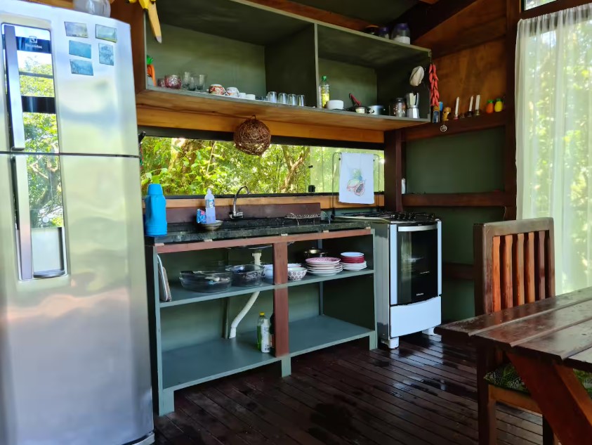 kitchen with a window above the sink, open shelves