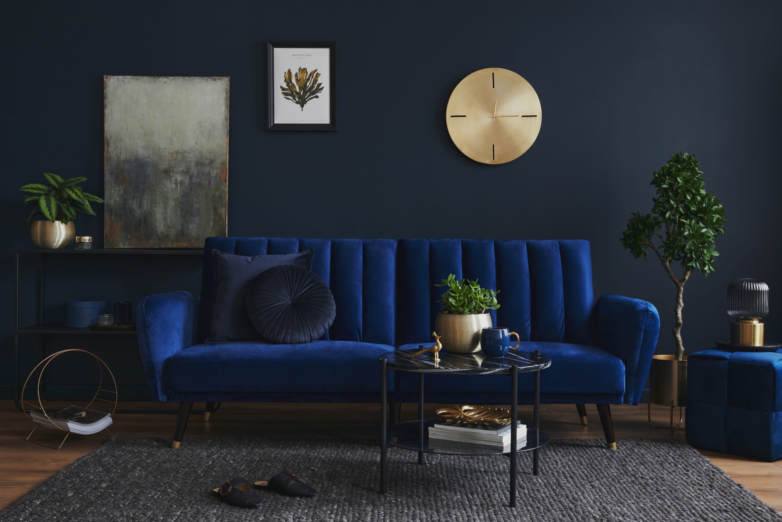 Moody blue living room with a gold clock